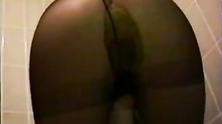 Hot brunette Japanese pooping in black pantyhose