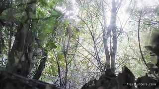 Pretty blonde peeing in a forest at a festival