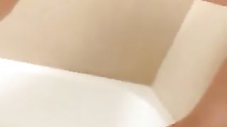 Hairy girl peeing in the tub while standing