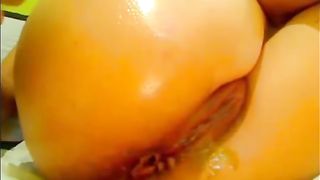 Fisting her tight butthole