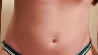 Perfect busty brunette peeing in her panties