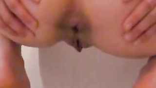 Beautiful teen shitting on a toilet