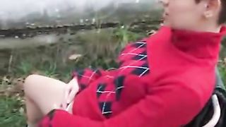 Young teen shitting and peeing in a park