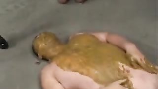 Hot mistress in black latex pooping on her slave