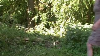 Tattooed slut has diarheea in a forest