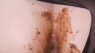 Sexy female slave pooping
