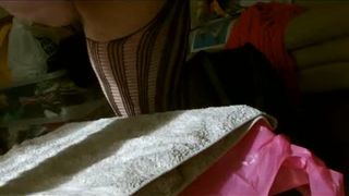 Granny rubbing crap on her big tits