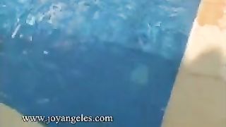 Two blonde girls pooping in the pool