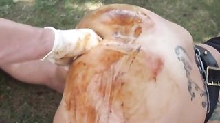 Fisting a chubby slut in the ass