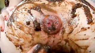 Fisting her shitty butthole from behind