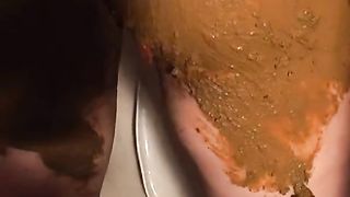 Naked girl smearing crap on her perfect body