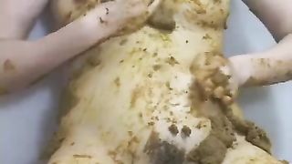 Japanese sitting with her ass on a pile of shit