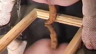 Horny MILF pooping on top of a mirror