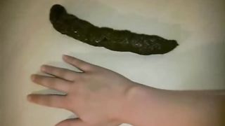 Perfect blonde girl dropped a long turd