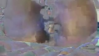 Amateur black lady pooping on the bed