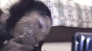 Thai slut rubbing liquid shit on her entire body