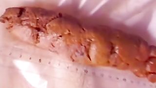 Huge brown turd from a sexy Japanese teen