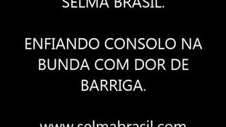 Shitting while riding a wall mounted dildo