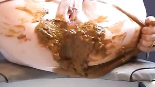 Liquid shit in white lace stockings
