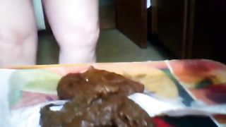 Mature fat lady spreading her cheeks while pooping