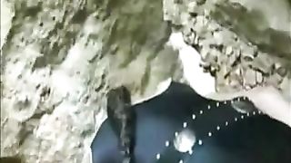 Brunette teen went to poop in a cave