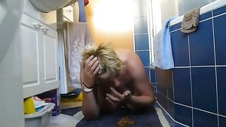 Mature lady eating and smearing poop on her tits