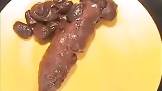 Perfect brunette model pooping on a yellow plate