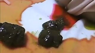 Drunk Japanese pooping near her panties