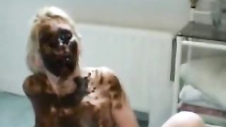 Blonde MILF smearing shit while giving head