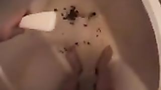 Hairy teen smearing crap on her feet