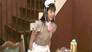 Brunette maid eating her own puke