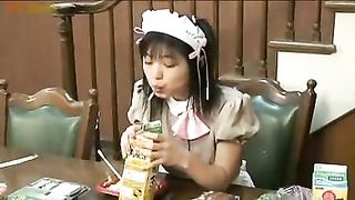 Brunette maid eating her own puke