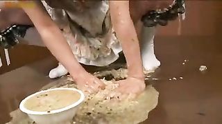 Brunette maid eating her own puke