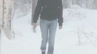 Sexy brunette shitting in the snow