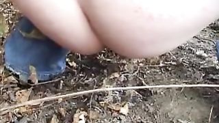 Fat redhead decides to take a shit outdoor