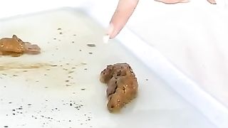 Chubby girl with blue hair smoking while pooping