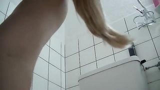 German blonde woman masturbating with a dildo