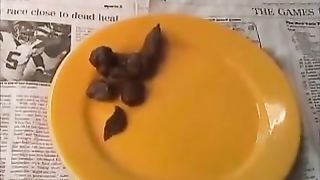 Hot ebony pooping on black homemade toilet