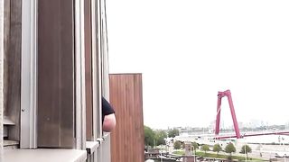 Shitting on some random guys from a window