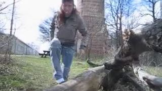 MILF undressed slowly to poop in a park