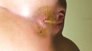 Young girl poopin g slowly in doggy style position