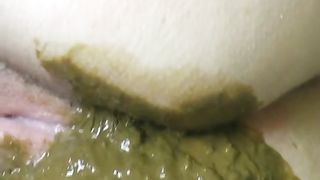 Pooping in her black and white pantyhose