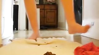 Nerd teen smearing shit on her naked body