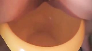 Blonde eating shit from a yellow bucket