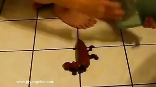 Blonde babe saving poop in a green lunch box