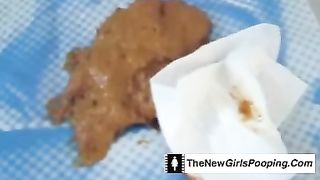 Perfect busty redhead pooping in close up