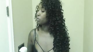 Beautiful black girl with curly hair farting