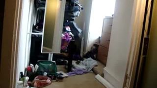 Young blonde pooping between her dirty clothes