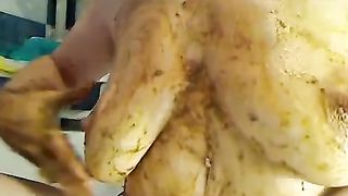 Amateur horny woman smearing crap on her tits