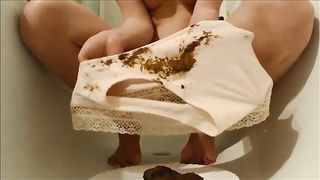 Dirty babe shitting in tight white panties